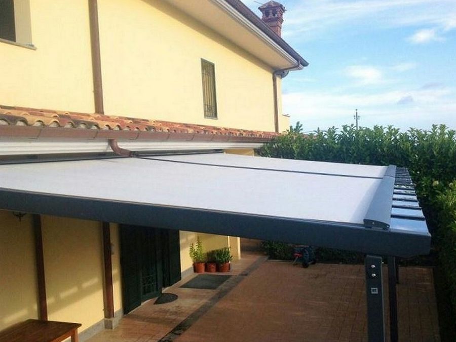 COPERTURA IN POLICARBONATO CON TENDA OMBREGGIANTE