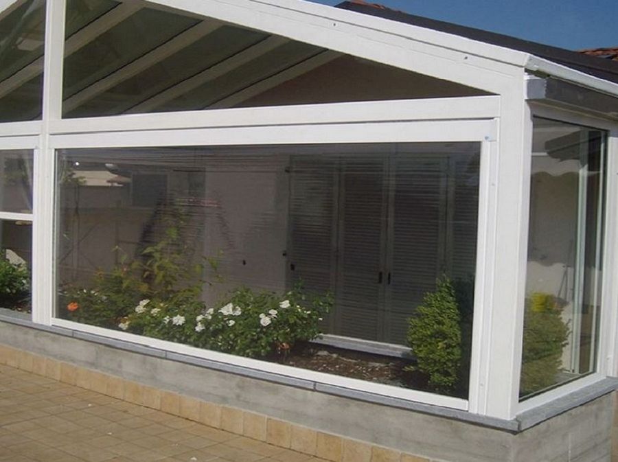 Chiusura balcone con vetri e tende antivento e antipioggia Idee veranda balcone